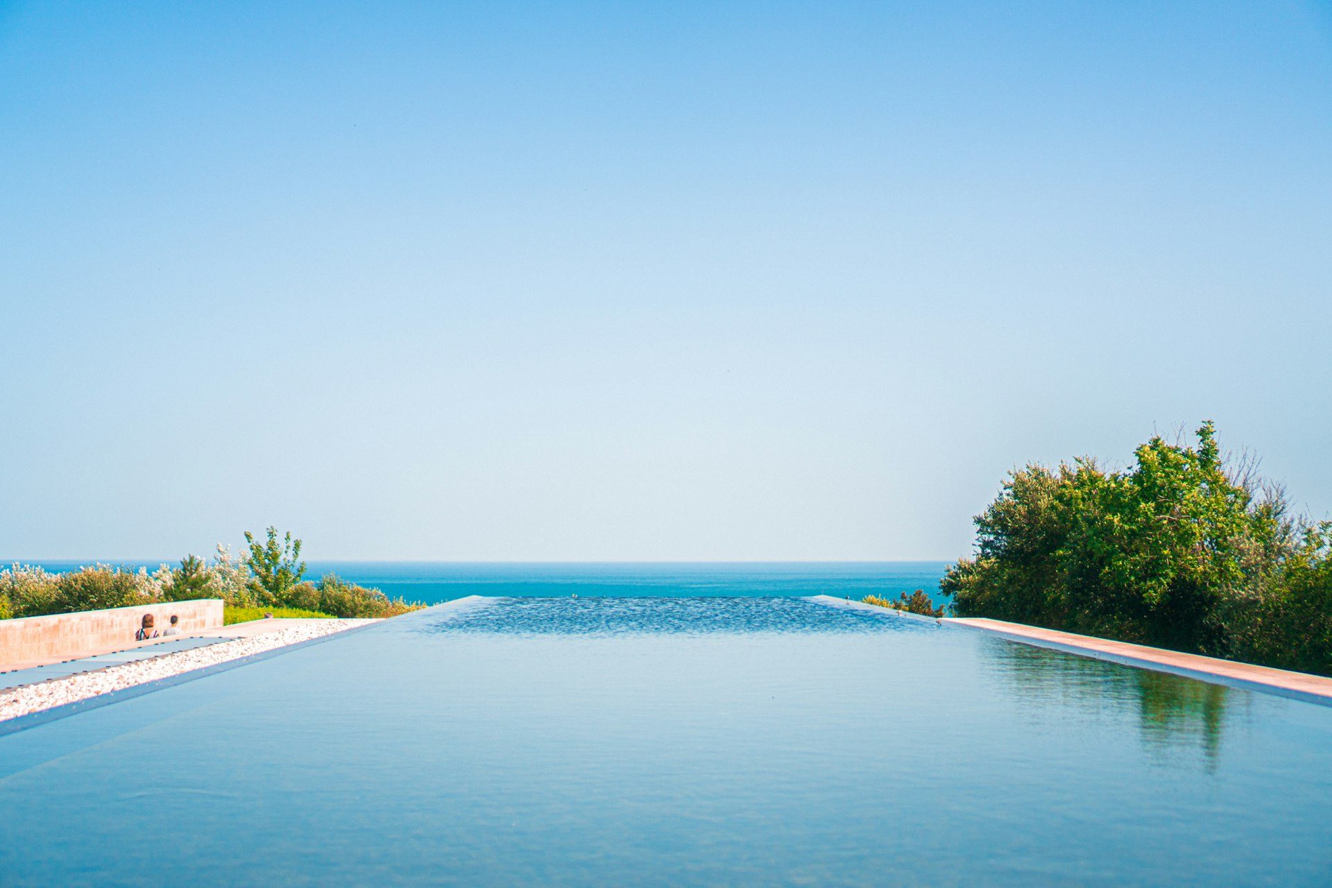 An infinity pool meeting the ocean