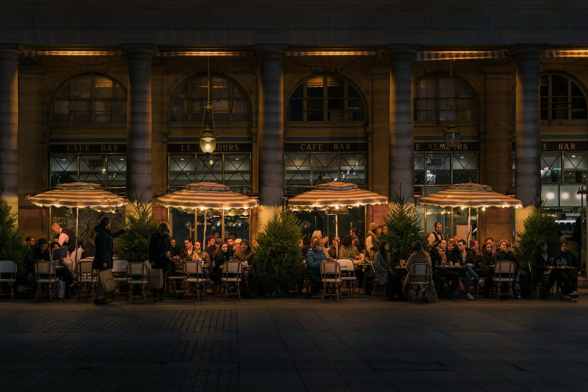 A cafe terrace at dusk